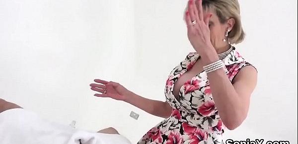  Adulterous english milf lady sonia flashes her oversized tits